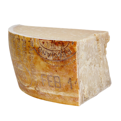 a half block of hard Parmigiano Reggiano cheese
