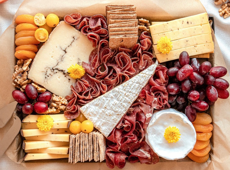Le Truffé cheese board with different types of cheeses for 6-8 people
