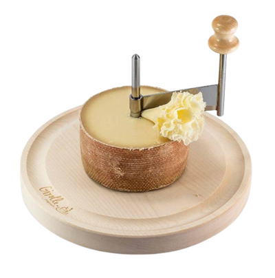 a cheese cutter cutting Tête de Moine cheese on top of a wooden plate