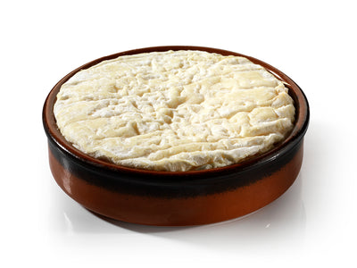 Saint-Félicien cheese kept in a brown container 