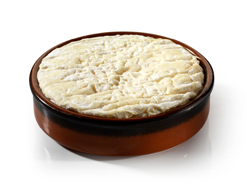 Saint-Félicien cheese kept in a brown container 